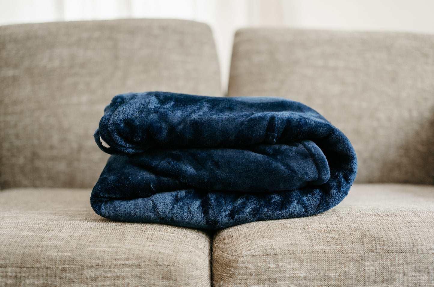 Throobie™ – The Reach-Through Blanket