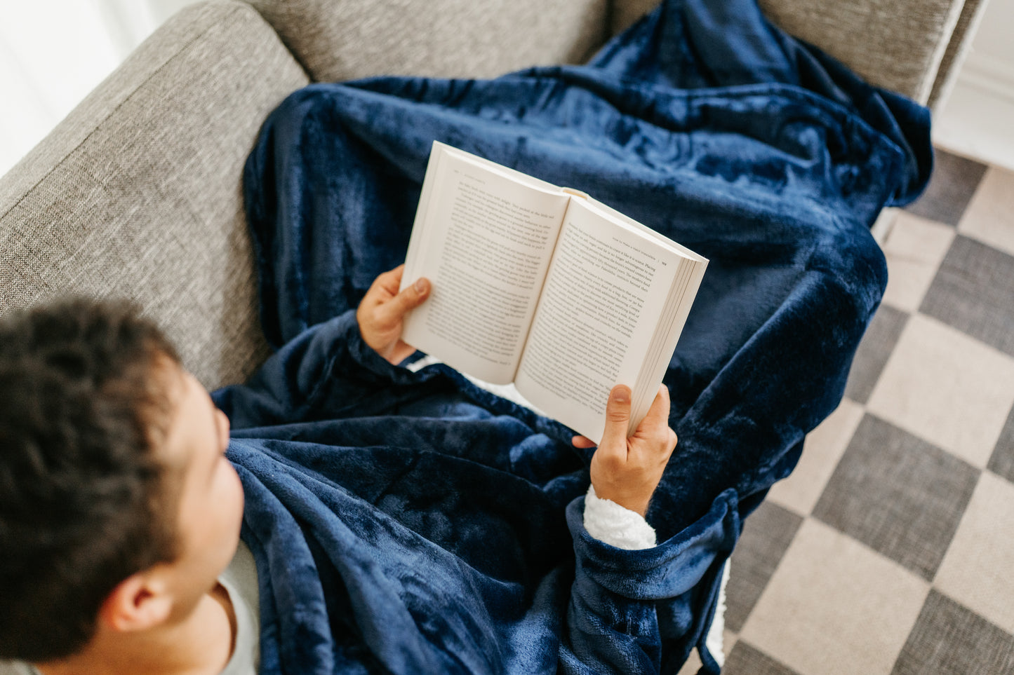 Throobie™ – The Reach-Through Blanket
