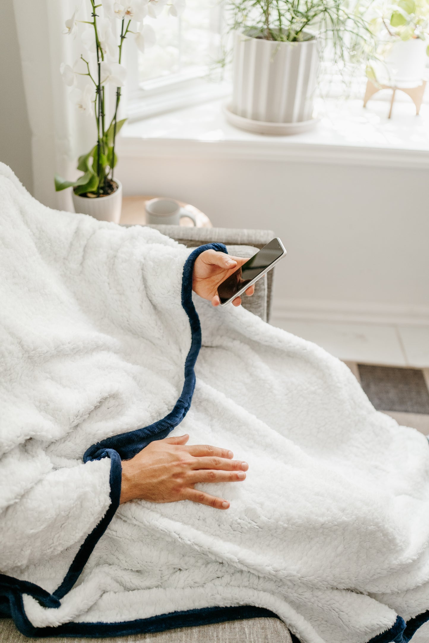 Throobie™ – The Reach-Through Blanket