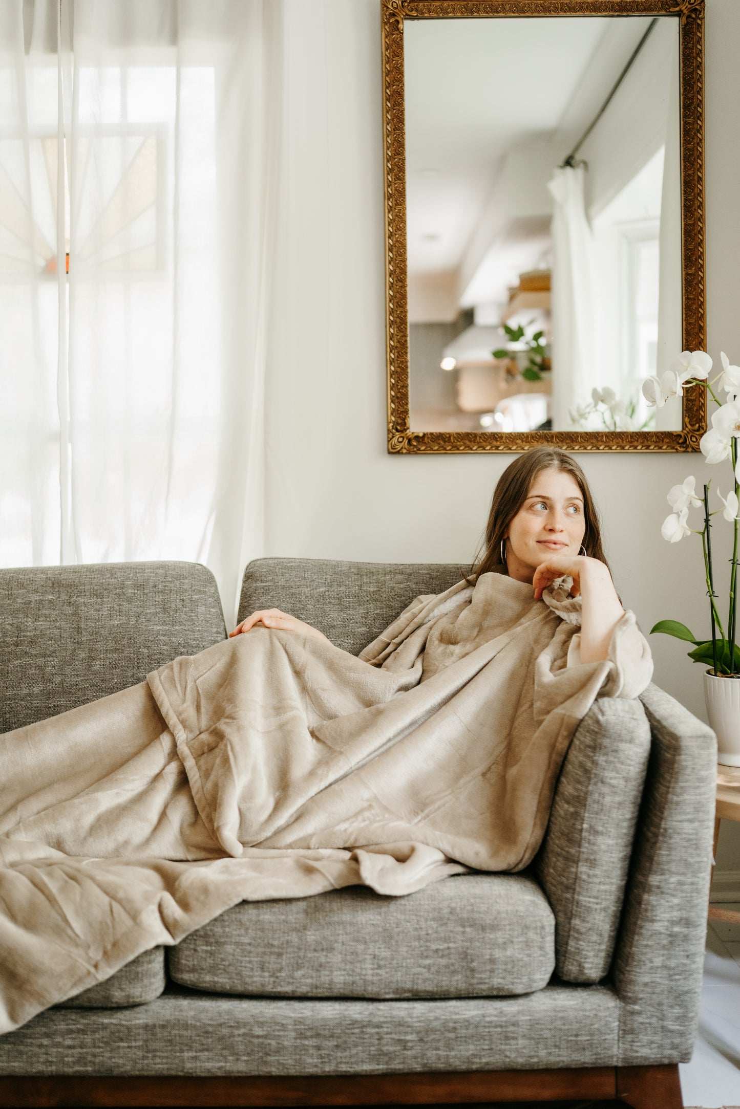 Throobie™ – The Reach-Through Blanket