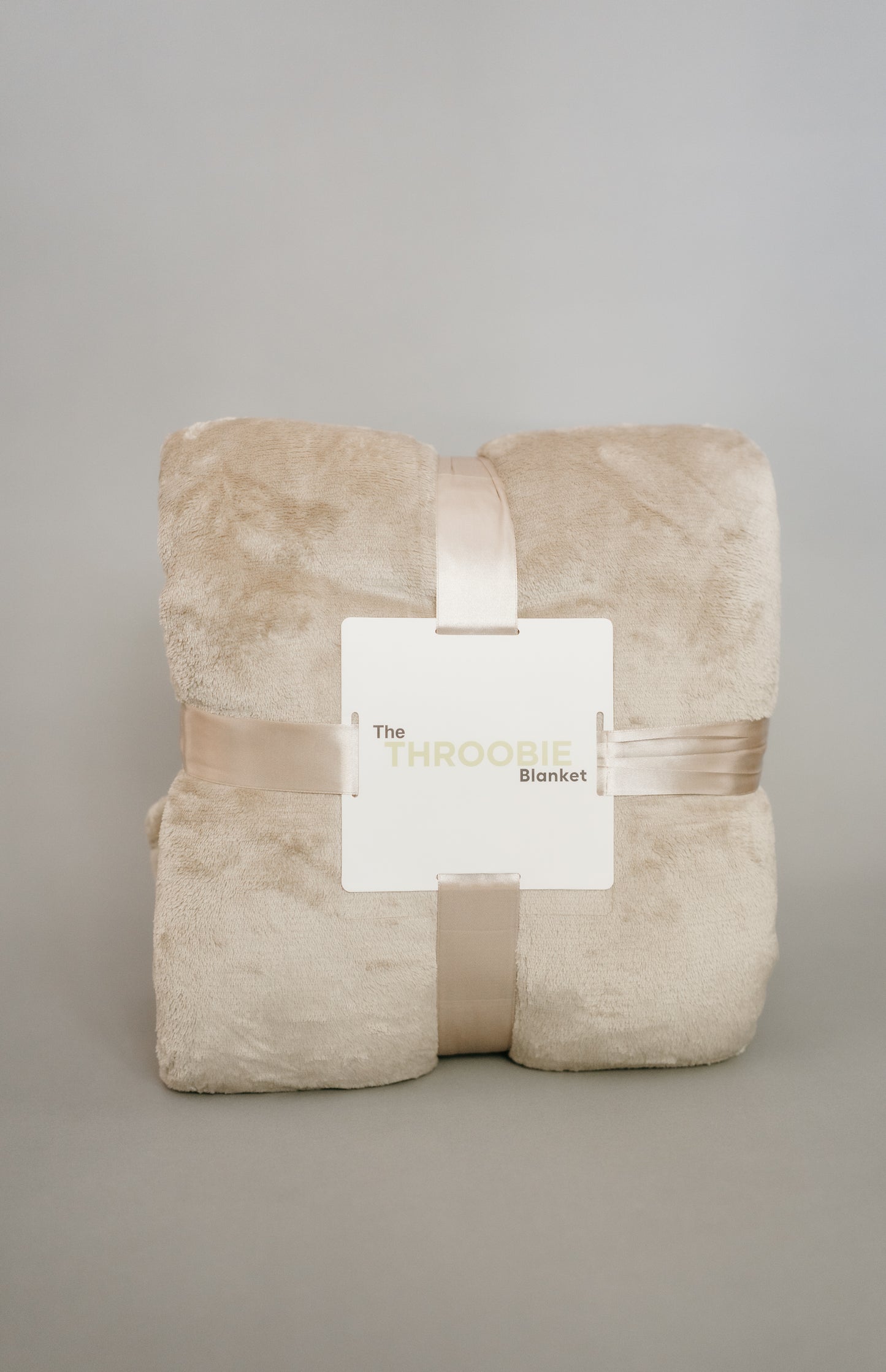 Throobie™ – The Reach-Through Blanket